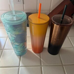3 Starbucks cups all three for 55 dollars